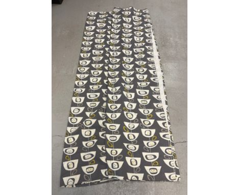 A pair of lined heavy cotton mix tape top curtains in grey, cream and mustard retro design, by John Lewis. Each curtain appro