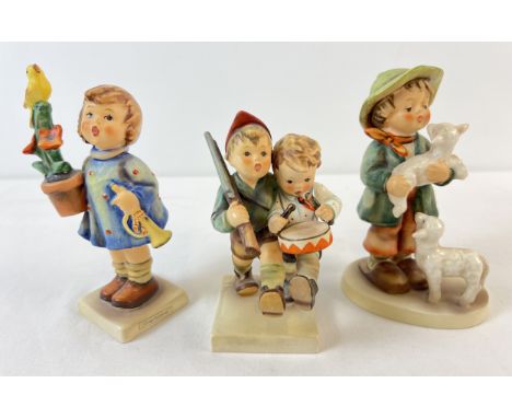 3 vintage 1970's Goebel ceramic Hummel figurines, 1972 - 79. Volunteers, Shepherd Boy and Congratulations. Largest approx. 5.