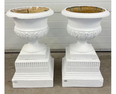 A pair of vintage large concrete 3 sectional pedestal garden planters, named Stiff &amp; son, London, painted white. Each app
