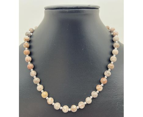 A 17" costume jewellery necklace of fossil jasper beads &amp; alternating silver tone beads. Jasper beads approx. 8mm diamete