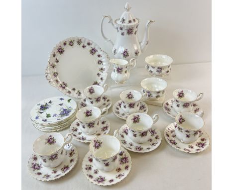 A Royal Albert first quality 'Sweet Violets' pattern coffee set finished with gilt detailing. Comprising: Coffee pot, 8 x cup