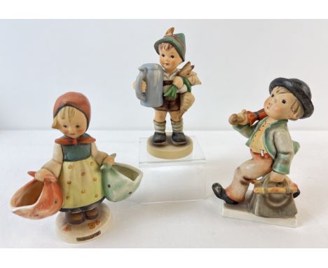 3 large Goebel Hummel figurines, 1960 - 72. Strolling Along (approx. 6" tall) together with Mothers Darling and For Father. A