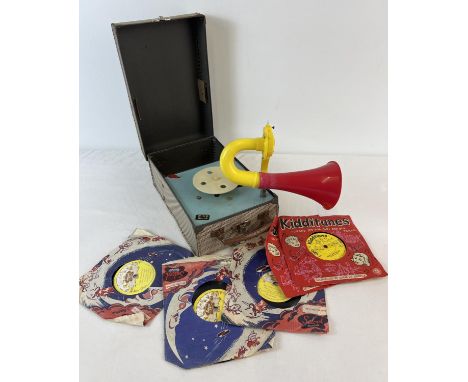 A vintage Kidditunes wind up gramophone in a carry case. Complete with trumpet, needles and a small collection of children's 