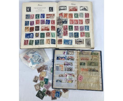 2 vintage stamp albums containing assorted world stamps, together with a few loose stamps. 