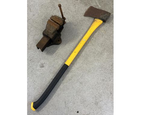 A vintage Woden 186B/2 bench vice together with a modern rubber handled axe. 