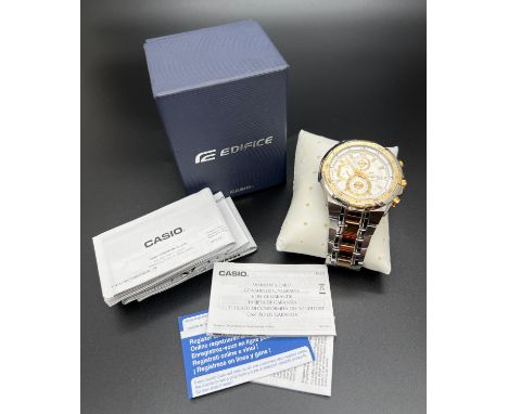 A boxed Ediface EFR539 DY men's chronograph wristwatch by Casio. Two tone stainless steel case and strap with white face and 