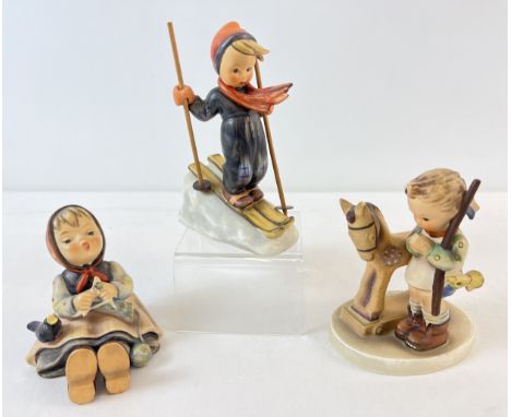 3 vintage Goebel ceramic Hummel figurines, 1960 - 72. Prayer before battle, Happy Pastime and Skier (a/f - small chip to unde