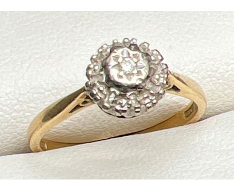 A vintage 18ct gold Illusion set diamond cluster style ring by Ronette. Gold marks to inside of band, ring size M½. Total wei