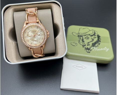 A ladies ES3466 chronograph wristwatch by Fossil, as new, complete with instruction book and presentation tin. Rose gold tone
