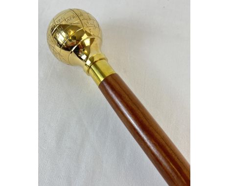 A modern wooden walking cane with spherical brass finial modelled as a globe. Approx. 94cm long. 