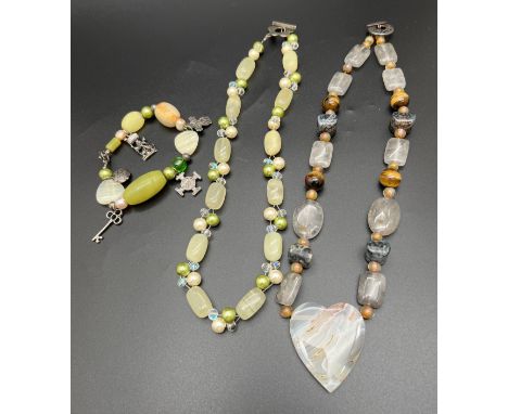 A natural green agate, freshwater pearl and glass bead necklace with matching bracelet. Together with a natural grey agate an