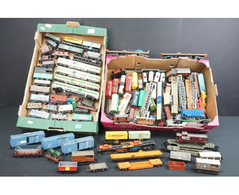 Around 125 OO / HO gauge items of rolling stock to include car transporters, wagons, tankers and trucks featuring 4 x Triang 