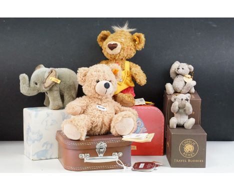 Three boxed / cased Steiff teddy bears to include Knopf the Golden Brown Teddy Bear No. 014444 (25cm) in suitcase, Flynn the 