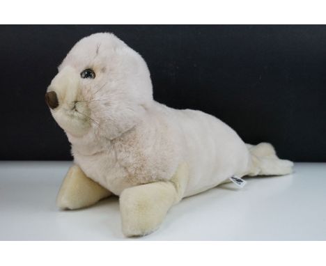 Large Merrythought Seal plush teddy with white fur and whiskers, with original Merrythought label to underside