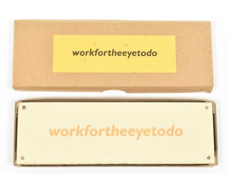 Enamel plaque with corner holes for fixing, 6.5 x 20.5 cm. Features the text 'workfortheeyetodo' in apricot on vanille colour
