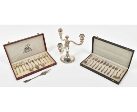 (1) 3-armed candlestick made of sterling silver. Marked w. 925 crown and sterling mark. (2) 2 cases w. teaspoons, sugar spoon