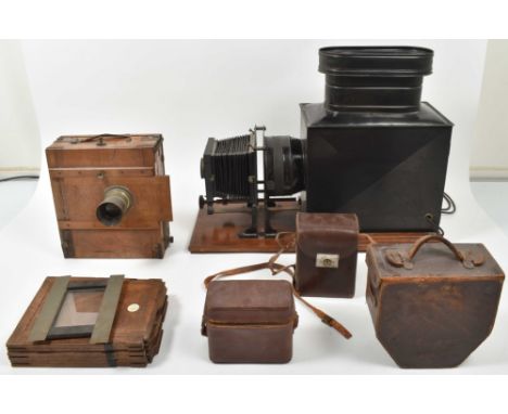 Philips magic lantern w. black leather bellows and attached metal lamp house/ chimney w. plug. Approx. 67 x 21 x 53 cm. Also 