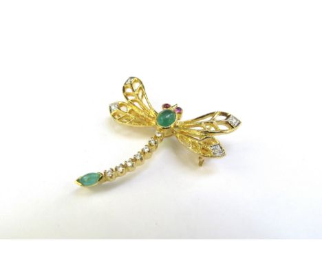 A gold dragonfly brooch/pendant unmarked, with ruby set eyes, cabochon jade and diamond wing tips and thorax, 3cm x 2.7cm, 3.