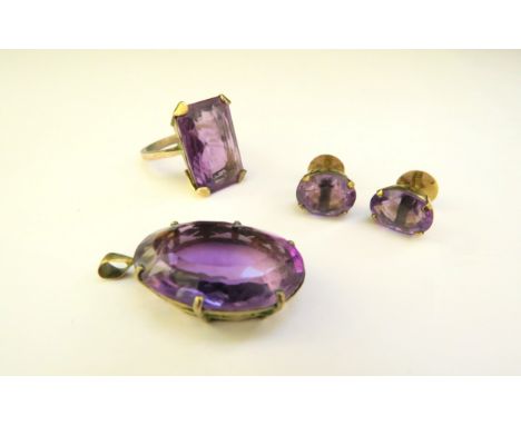 An amethyst ring, size O, earrings and pendant, all unmarked 
