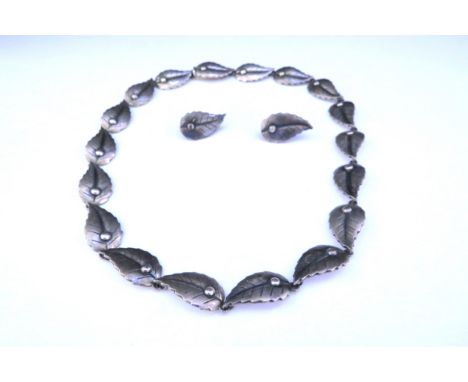 A mid century Danish silver necklace by John Lauritzen comprising leaf shaped decorative links, concealed clasp, length appro