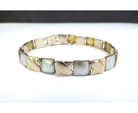 A Murrle Bennett arts and crafts gold and blister pearl bracelet, marked 9ct, 18.5cm long, 9.3g
