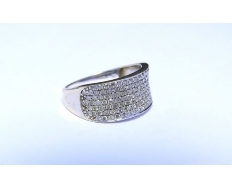 A 9ct white gold multi-stone diamond half hoop ring. Size Q/R, 3.4g 