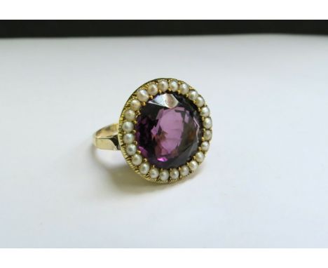 An amethyst and seed pearl ring, 2cm diameter. Size L, 8.1g 