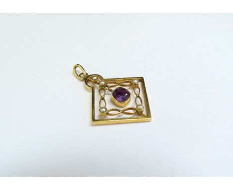 An Edwardian grey seed pearl and amethyst drop pendant, unmarked gold, 2.9g 
