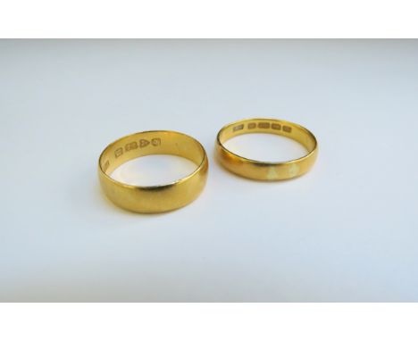 Two 22ct gold wedding bands, sizes R/S and O/P, 7.6g 