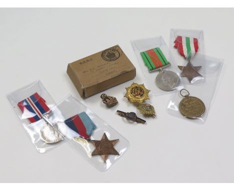 WW2 group in named box of issue to Mr R J Rutland ASC, Wealdstone, Harrow. 1939-45 Star, Italy Star, Defence & War Medal. Plu