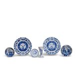 THREE BLUE AND WHITE SAUCER DISHES, A BLUE AND WHITE BEAKER VASE, AND A PAIR OF BLUE AND WHITE D...