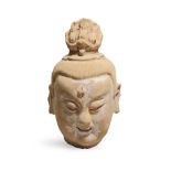 A STUCCO HEAD OF A DEITY Song-Ming Dynasty