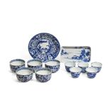 TWO SETS OF FIVE BLUE AND WHITE CUPS, A LANDSCAPE TRAY AND A KRAAK-STYLE DISH 19th Century (12)