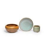 A JUNYAO DISH, A CELADON GLAZED CYLINDRICAL INCENSE BURNER AND A RUSSET SPLASHED BLACK GLAZED WA...