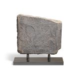 A RECTANGULAR STONE PLAQUE INCISED WITH A SEATED FIGURE Tang dynasty