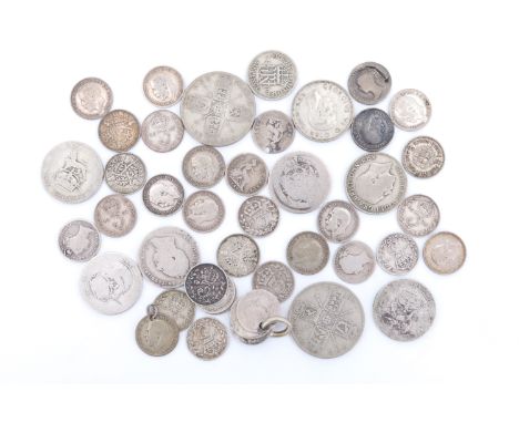 A group of early Victorian and later silver coins, including threepence, two 1921 one florin coins, a 1912 (first type) one s
