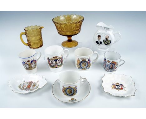 A group of Victorian and later commemorative wares including a Queen Victoria Diamond Jubilee pressed amber glass milk jug an