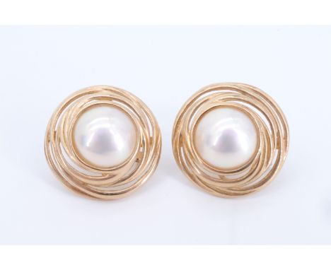 A pair of 9 ct gold mounted blister pearl earrings, 24 mm, 12.3 g