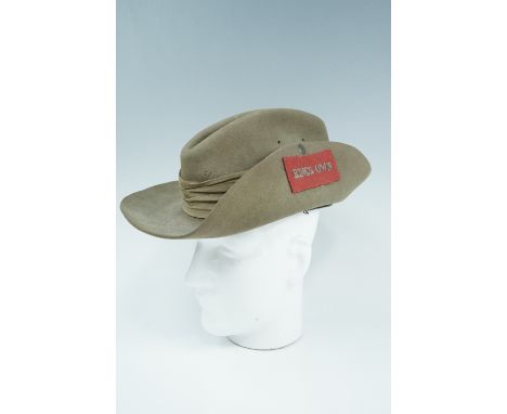 A 1942 British army slouch hat bearing a King's Own (Royal Lancaster) Regiment embroidered flash