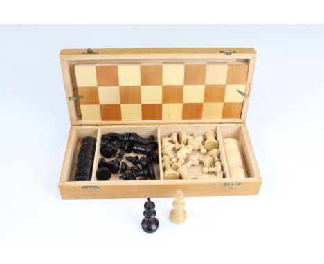 A cased folding wooden chess and checkers set, 30 x 13.5 x 5.5 cm