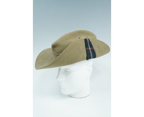 A 1942 dated British army slouch hat bearing a Highland Light infantry Mackenzie Tartan highland regimental flash