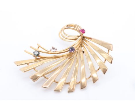 A vintage flamboyant gem-set 9 ct gold brooch, comprising a fanned array of tapering bars interspersed with variously coloure