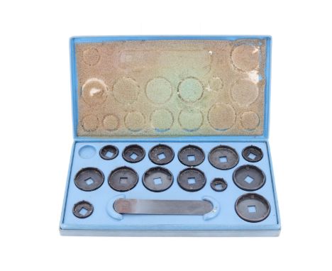 A vintage Tissot cased watch back removal tool set