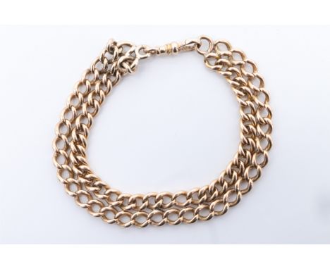A vintage yellow metal double curb link bracelet, (tested as high carat gold), 21 cm, 41 g