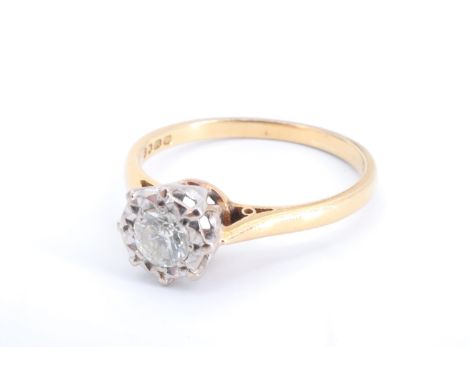 A vintage diamond solitaire ring, the brilliant cut stone of approximately a quarter carat, illusion set on a gallery between