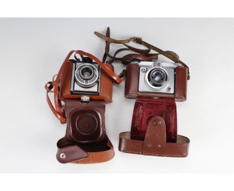 An Illford "Sportsman" 1:3,5 / 45 mm camera, together with another West German camera