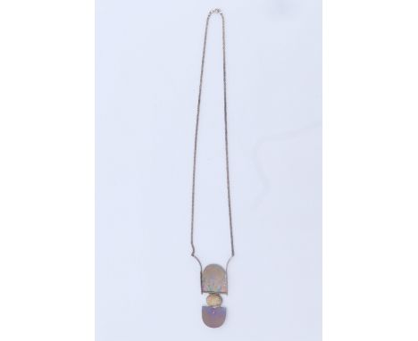 A modernist opal and white metal necklace, comprising a 15 x 11 mm opal cabochon bezel set above a D shaped flat panel, and h