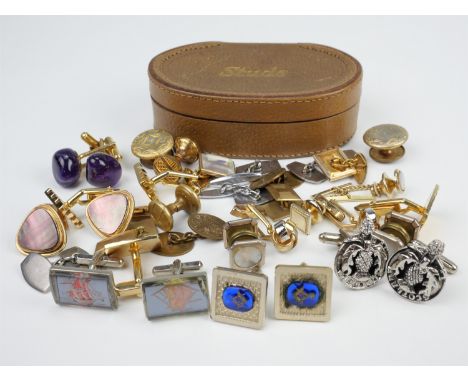 A quantity of late 20th Century cufflinks and shirt studs, in a vintage leather 'studs' case