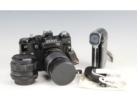 A Soviet era Zenit II 1:2.8 f = 135 mm camera, together with a cased Traveller 5MP HD digital video camera and instructions, 