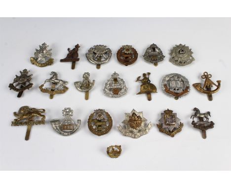 A group of British army cap badges